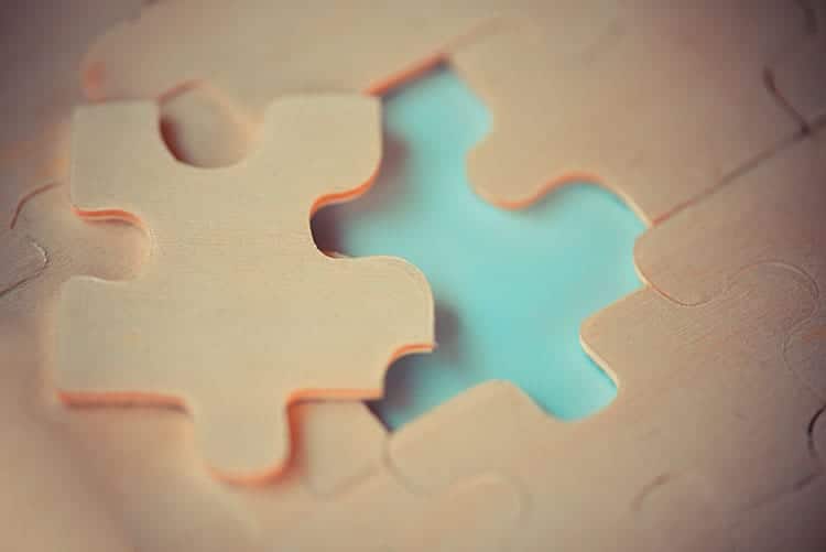 close-up-jigsaw-pieces-joining-trying-connect-business-partn--EPS