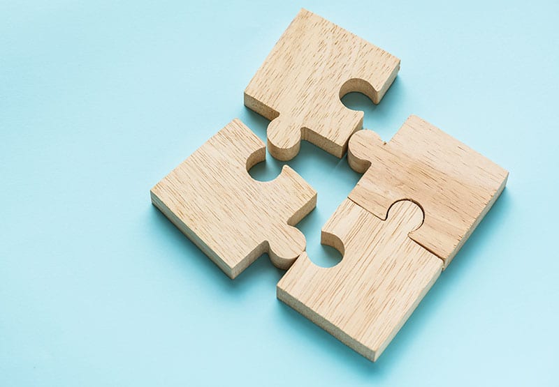 jigsaw-teamwork-concept-macro-shot