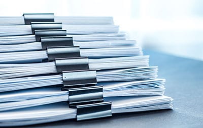 stacks-documents-files-with-black-clip
